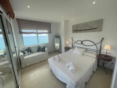 Cama o camas de una habitación en Villa Farell just in front of the sea
