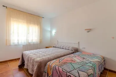 Cama o camas de una habitación en Club Villamar - Arboc