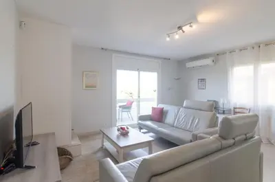 Una televisión o centro de entretenimiento en Club Villamar - Residencial Park