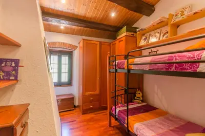 Cama o camas de una habitación en Club Villamar - Masia Can Vilar