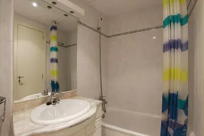 Un baño de Club Villamar - Apartment Amatella