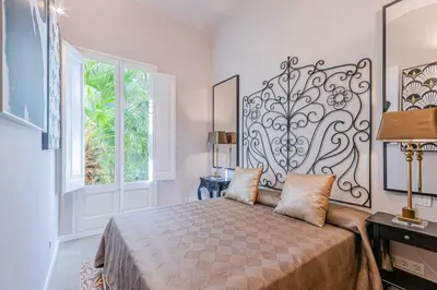 Cama o camas de una habitación en El Petit Palauet