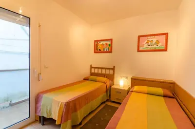 Cama o camas de una habitación en Club Villamar - Can Ribo