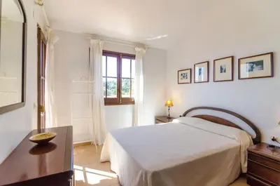 Cama o camas de una habitación en Club Villamar - Casita Carmen 17