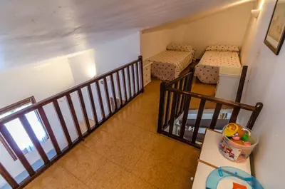 Cama o camas de una habitación en Club Villamar - Casita Carmen 17