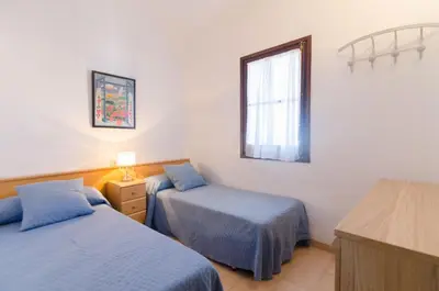 Cama o camas de una habitación en Club Villamar - Casita Carmen 17