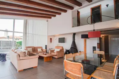 Zona de estar de Club Villamar - Monnee