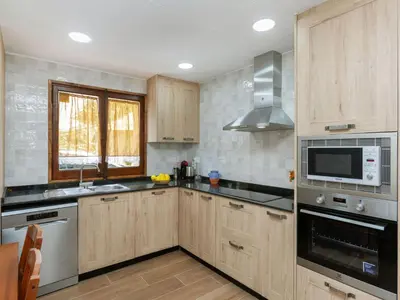 Una cocina o zona de cocina en Holiday Home El Raco by Interhome