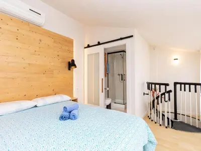 Cama o camas de una habitación en Apartment Industria by Interhome