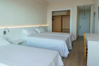 Cama o camas de una habitación en Checkin Catalonia