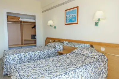Cama o camas de una habitación en Checkin Catalonia