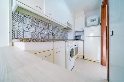 Una cocina o zona de cocina en HomeHolidaysRentals Cyan- Costa Barcelona