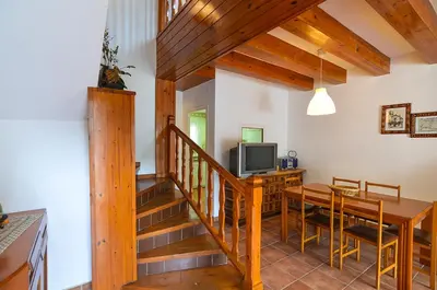 Una televisión o centro de entretenimiento en Club Villamar - Solterra