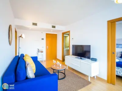 Una televisión o centro de entretenimiento en Apartamento Diana en Platja d'Aro