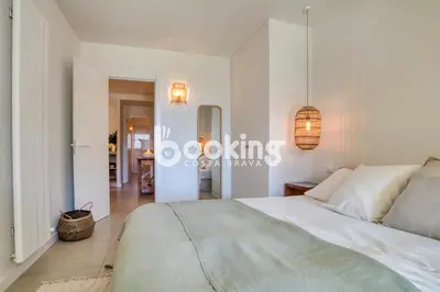Cama o camas de una habitación en Las Velas I Planta baja en S'Agaró con vista mar y agradable terraza con acceso directo a la piscina