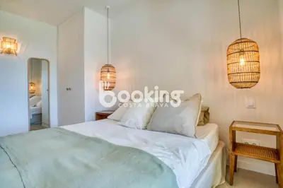 Cama o camas de una habitación en Las Velas I Planta baja en S'Agaró con vista mar y agradable terraza con acceso directo a la piscina