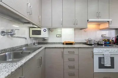 Una cocina o zona de cocina en Apartamento primera línea de mar Palamós