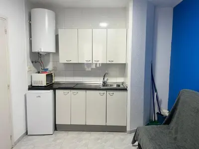 Una cocina o zona de cocina en Apartaments Monjardí