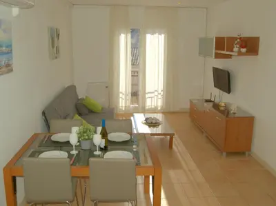 Una televisión o centro de entretenimiento en Apto Liss 50 metros de la playa