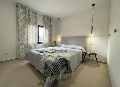 Cama o camas de una habitación en Can Candiu. Establecimiento de 2 casas enteras