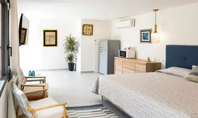 Cama o camas de una habitación en Can Candiu. Establecimiento de 2 casas enteras