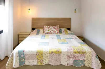 Cama o camas de una habitación en Can Candiu. Establecimiento de 2 casas enteras