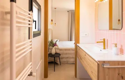 Cama o camas de una habitación en Can Candiu. Establecimiento de 2 casas enteras