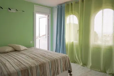 Cama o camas de una habitación en Apartment Platja de Aro with sea view