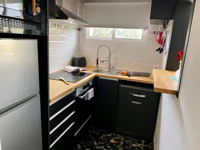 Una cocina o zona de cocina en Apartament per parelles reformat amb piscina