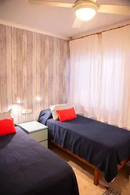 Cama o camas de una habitación en Agradable y tranquilo apto a 500m de la playa
