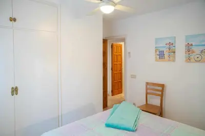 Cama o camas de una habitación en Agradable y tranquilo apto a 500m de la playa