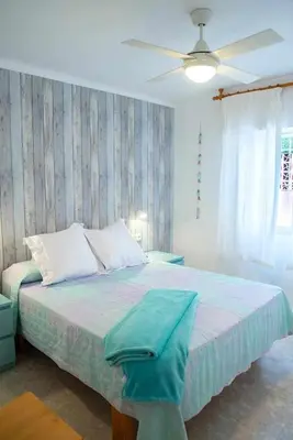 Cama o camas de una habitación en Agradable y tranquilo apto a 500m de la playa