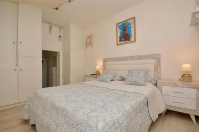 Cama o camas de una habitación en Apartment Playa de Aro con vistas al mar