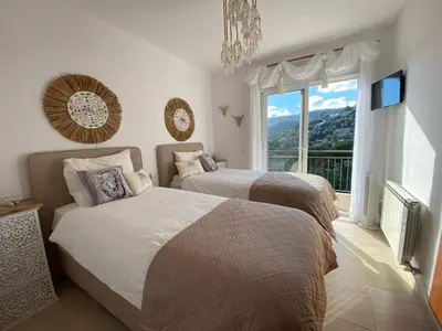 Cama o camas de una habitación en Villa Sadeza