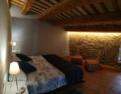 Cama o camas de una habitación en Mas Can Puig de Fuirosos ONLY ADULTS