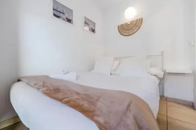 Cama o camas de una habitación en Hauzify I Apartament Llevant