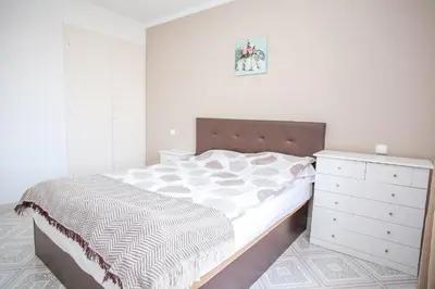 Cama o camas de una habitación en Central Beach Modernist Apartment