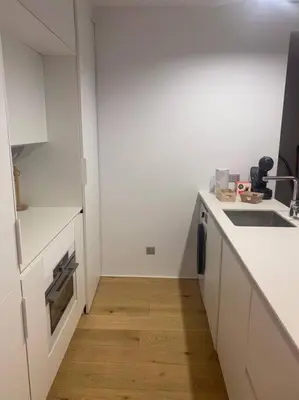 Una cocina o zona de cocina en Piso LUJO de la Playa Lloret.