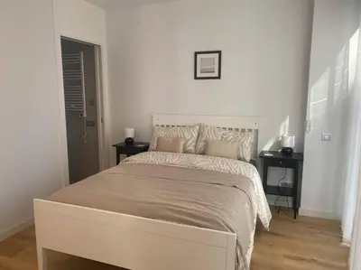 Cama o camas de una habitación en Piso LUJO de la Playa Lloret.