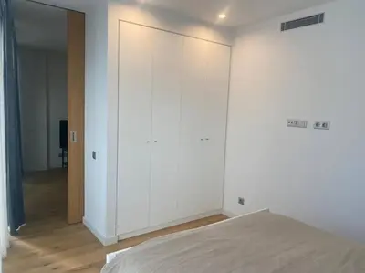 Cama o camas de una habitación en Piso LUJO de la Playa Lloret.