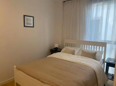 Cama o camas de una habitación en Piso LUJO de la Playa Lloret.