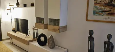 Una televisión o centro de entretenimiento en LLOGUER30 Mamour, cómodo y familiar