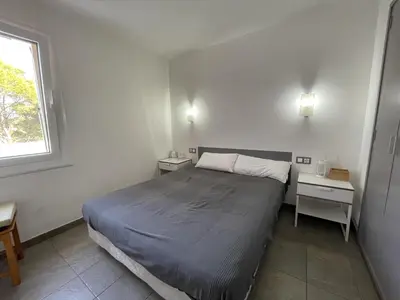 Cama o camas de una habitación en Acogedor apartamento con piscina comunitaria, cerca de la playa de Sa Tuna - ES-226-26