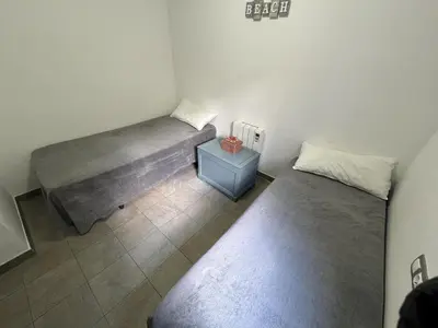Zona de estar de Acogedor apartamento con piscina comunitaria, cerca de la playa de Sa Tuna - ES-226-26
