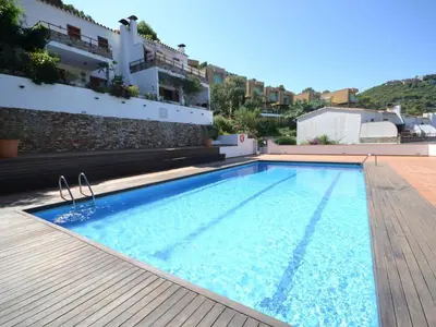 Piscina en o cerca de Acogedor apartamento con piscina comunitaria, cerca de la playa de Sa Tuna - ES-226-26