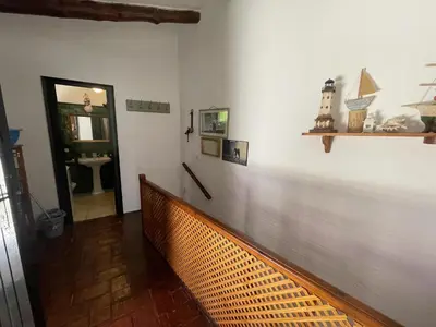 Una televisión o centro de entretenimiento en Encantadora Casa de Pescadores en Sa Tuna, Terraza - ES-226-27
