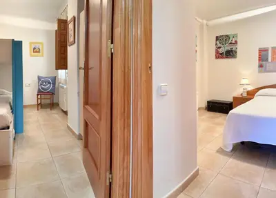 Cama o camas de una habitación en LETS HOLIDAYS CENTRIC APARTMENT with POOL in TOSSA 2