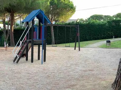 Zona de juegos infantil en Casa con impresionantes vistas al mar