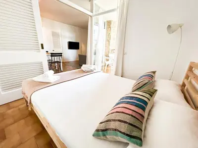 Cama o camas de una habitación en Apartamento con piscina en Platja d'Aro