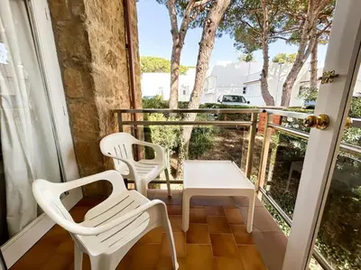 Un balcón o terraza de Apartamento con piscina en Platja d'Aro